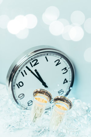 Timeless celebration with champagne glasses and clock at midnight countdown event