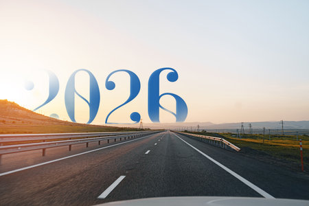 Year 2026 welcomes new journeys along an open road at sunset