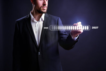 Business professional making projections from 2026 to 2027 with digital interfaceの写真素材