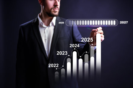 Businessman analyzing growth projections for the years 2022 to 2027 in a modern setting