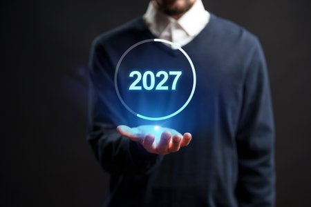 Holding the future in hand with the year 2027 displayed in a glowing sphere