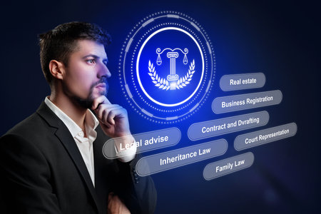 Lawyer contemplating legal services in a modern digital workspace at nightの写真素材