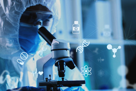 Scientist examining samples with a microscope in a laboratory during research activities