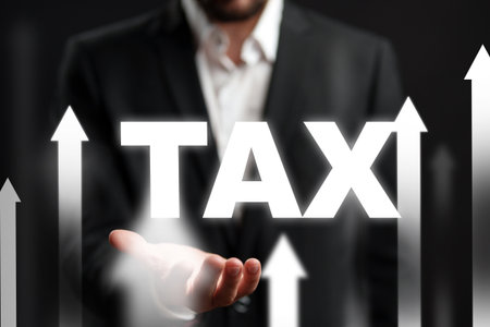 Graphic showing increasing taxi demand with business person holding the word taxiの写真素材