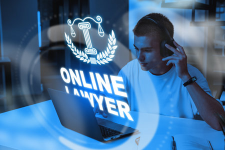 Lawyer consulting with clients through online platform using computer and headsetの写真素材