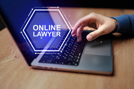 Finding legal advice through online services while using a laptop at homeの写真素材