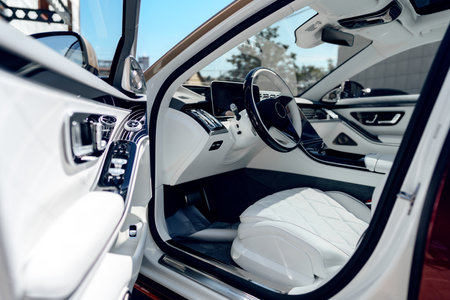 Luxurious car interior showcasing sleek design and advanced technology featuresの写真素材