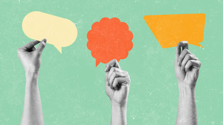 Hands holding colorful speech bubbles against a light green background in a creative design setting