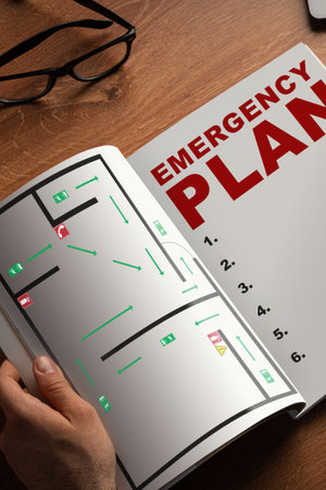Understanding emergency plans in safety manuals for building managementの写真素材