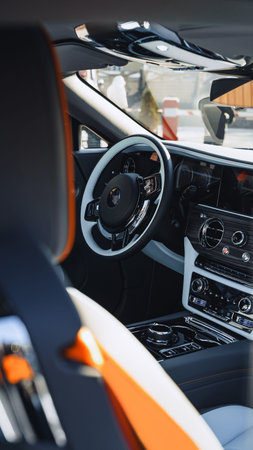 Interior view of a modern car showing dashboard and steering wheel details