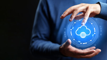 Hands hold a glowing cloud symbol with a globe, showing digital connection and technology use
