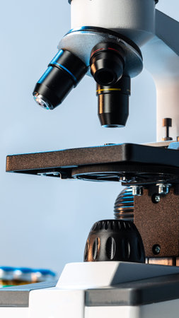 Microscope in a lab setting used for scientific observation and research tasks