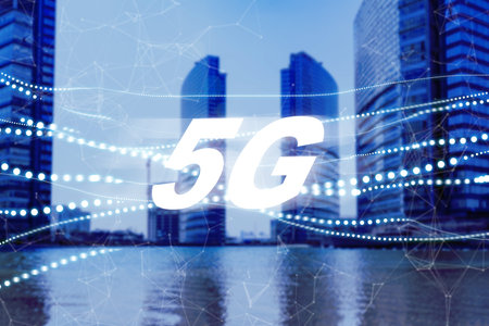 5G internet technology is seen in a city with tall buildings beside water during daytime