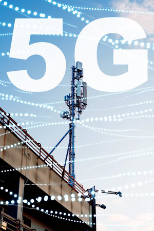 5G internet tower stands tall against blue sky with data signals in the background