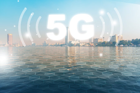 5G internet connection over water with city skyline in the background during daytime