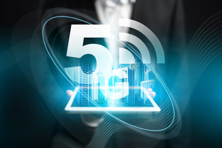 5G internet technology is presented on a tablet with a city skyline in the background
