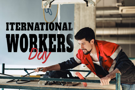 Celebration of International Workers Day with a worker on a construction site on May 1