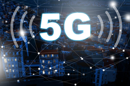 5G internet technology signals improved connection in urban landscape at night