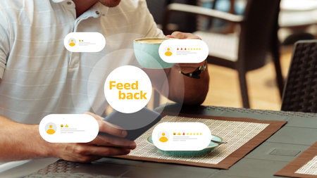 User reviews coffee while holding a phone in a cafe setting during daytime