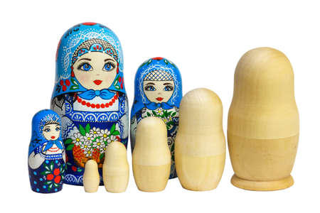 Three traditional Russian matryoshka dolls and blanks for painting dolls. Clean matryoshkaの写真素材