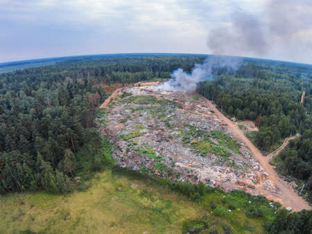 The view from the height of smoke fire on garbage dumpの写真素材