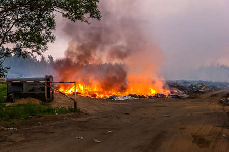 Burning garbage in the landfill solid waste. Fire.の写真素材