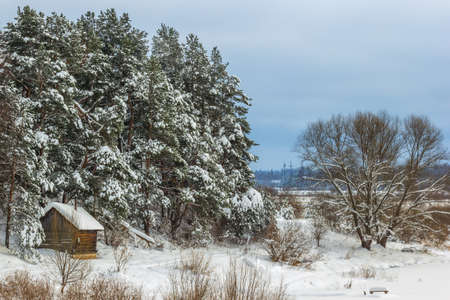 Country sauna in the snow, on the river Mologa in the winter.の写真素材
