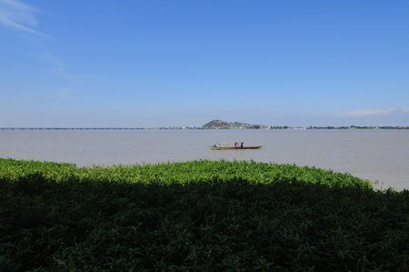 Fishermen on the Guayas River. Along the Guayas river it is common to see small boats doing artisanal fishing.の写真素材
