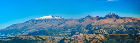 Panoramic views of the imposing Pichincha volcano in the Andes, with the Puengasi hill in the foreground.の写真素材