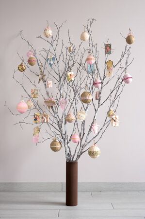 Christmas tree made from branches and vintage balls and decoration. Alternative Christmas treeの写真素材