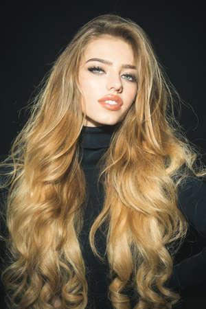 Passionate sexy attractive beautiful blonde woman with healthy long hair, perfect makeup, open...