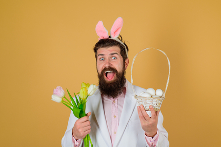 Religion symbol. Tradition of Easter. Bunny ears. Preparing for Easter. Happy Easter. Bearded man....