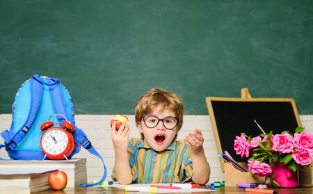 Back to school. Surprised boy in glasses. Homework. Lessons. School subjects. Education concept....