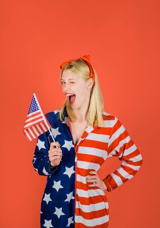 Make america great again. Independence Day. July 4th. American flag. America. United states. USA. United states of America. US. Summer. Winking woman with American flag.の写真素材