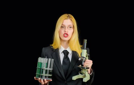 Science. Chemistry. Test tubes. Success. Education. Woman with chemical test tubes. Girl with...