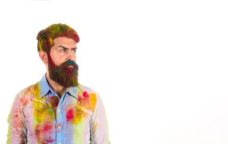 Decorator with hair&beard dirty in paints. Art concept. Painter man. Serious bearded painter in shirt in paint. Builder worker in messy shirt. Craftsman, painter man in paint dirty shirt. Copy space.の写真素材
