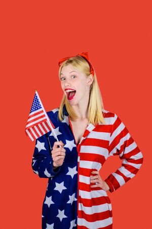Make america great again! Independence Day. American flag. America. United states. USA. United states of America. US. July 4th. Summer. Happy woman with American flag.の写真素材