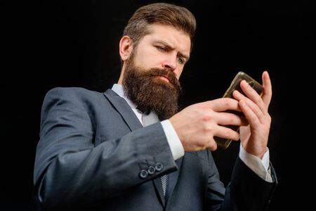 Social media. Blog. Man typing message. Sms. Internet. Hashtag. Smartphone. Marketing. Web. Dependence. Communication. Looking at screen.の写真素材