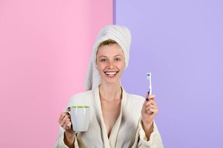 Woman with toothbrush. Morning treatments. Health. Teeth. Morning. Morning procedures. Daily routine. Morning procedures. Awakening. Toothpaste. Toothbrush. Dental hygiene. Girl brushing teeth.の写真素材