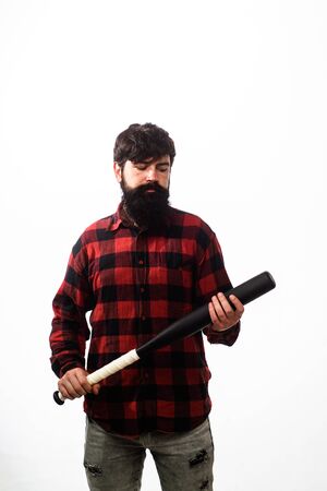 Bearded man with baseball bat. Sports and baseball training. Power and energy concept. Baseball player with baseball bat. Sport, training, health. Fashionable man wearing plaid shirt. Sport equipmentの写真素材
