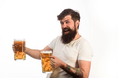 Stylish guy at cafe pub. Beer time. Alcohol, harmful habits. Emotional bearded drunk hipster male...