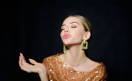 Makeup and cosmetic. Beautiful model girl with manicure on nails. Beauty, stylish accessories. Fashion wear. Beauty trends. Beautiful fashion woman with jewelry. Fashionable jewelryの写真素材