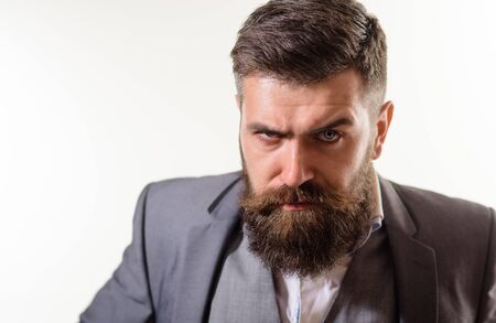 Serious bearded businessman. Sexy male, macho, long beard. Stylish handsome business man. Attractive bearded man portrait. Handsome man with beard. Male fashion concept. Handsome stylish bearded manの写真素材