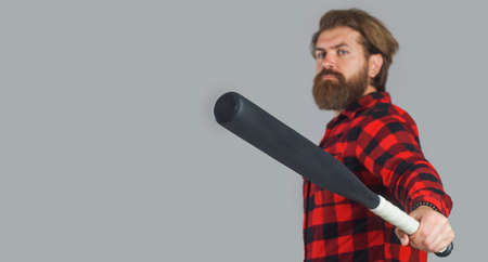 Bearded male player with baseball bat. Selective focus. Baseball game. Sport equipment. Sports and...