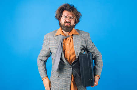 Confused teacher or businessman with suitcase. Bearded man in suit with briefcase. Education....