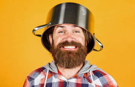 kitchenware. Cooking utensil for food preparation. kitchen cookware. Crazy chef with pot on head