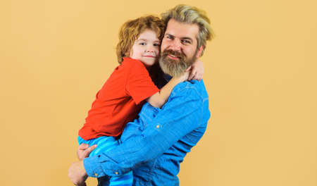 Father hugs with son. Family or Fathers day. Dad and child boy embrace. Parenthood, childhoodの写真素材