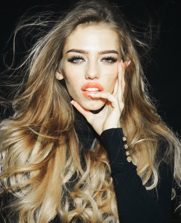 Sensual model girl with healthy hair, perfect makeup, thick eyelashes. Cosmetics, skincare, haircareの写真素材