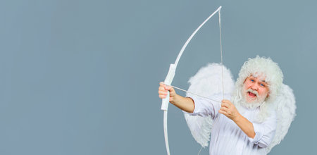 Happy Valentines Day. Cupid angel in white wings with bow and arrows. God of love. February 14