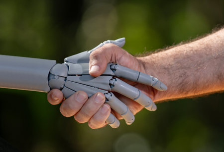 Robot and human hands in digital future. Robotic hands with human ai. Robot hands on intelligence concept. Human hands with robot innovation.の写真素材